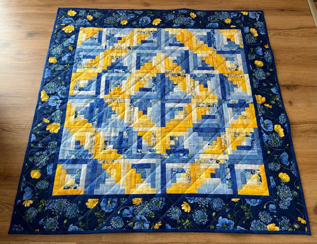 Log Cabin Blau Gelb